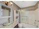 Bathroom featuring a glass sink, granite countertop, and a shower/tub at 5040 Sublight Ave, Las Vegas, NV 89108