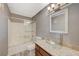 Bathroom with glass shower, vessel sink, and granite countertop at 5040 Sublight Ave, Las Vegas, NV 89108