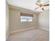 Bright bedroom with wood-look flooring and ceiling fan at 5040 Sublight Ave, Las Vegas, NV 89108