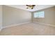 Bright bedroom with ceiling fan and light wood flooring at 5040 Sublight Ave, Las Vegas, NV 89108
