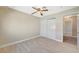 Light bedroom with wood-look flooring and double closet at 5040 Sublight Ave, Las Vegas, NV 89108