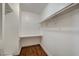 White built-in closet with shelves and rods at 5040 Sublight Ave, Las Vegas, NV 89108