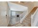 Entryway with staircase, wood-look floors and fireplace at 5040 Sublight Ave, Las Vegas, NV 89108