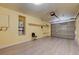 Attached garage with vinyl flooring and ample storage at 5040 Sublight Ave, Las Vegas, NV 89108
