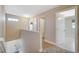 Upstairs hallway with carpet and doors to bedrooms and bathroom at 5040 Sublight Ave, Las Vegas, NV 89108