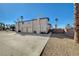 Two-story house with three-car garage and desert landscaping at 5040 Sublight Ave, Las Vegas, NV 89108