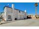 Two-story house with three-car garage and desert landscaping at 5040 Sublight Ave, Las Vegas, NV 89108