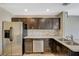 Modern kitchen with stainless steel appliances and granite countertops at 5040 Sublight Ave, Las Vegas, NV 89108