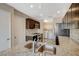 Kitchen with granite countertops and double stainless steel sink at 5040 Sublight Ave, Las Vegas, NV 89108