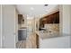 Modern kitchen with granite countertops and stainless steel appliances at 5040 Sublight Ave, Las Vegas, NV 89108
