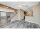 Bright living room with wood-look floors, fireplace, and access to backyard at 5040 Sublight Ave, Las Vegas, NV 89108