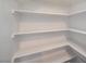 Bright walk-in pantry with ample shelving at 5040 Sublight Ave, Las Vegas, NV 89108