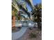 Inviting community pool with palm trees and seating at 5040 Sublight Ave, Las Vegas, NV 89108