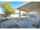Backyard with covered patio and grassy area at 5916 Naperville St, Las Vegas, NV 89130