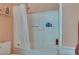 Clean bathroom with tub, shower, and white tile at 5916 Naperville St, Las Vegas, NV 89130