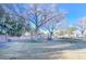 Community common area with trees and picnic table at 5916 Naperville St, Las Vegas, NV 89130
