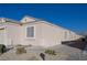 Side view of a single-story house with a walkway and gravel landscaping at 5916 Naperville St, Las Vegas, NV 89130