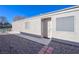 Side view of house showing entrance and landscaping at 5916 Naperville St, Las Vegas, NV 89130