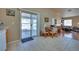 Kitchen features a breakfast nook and sliding door to patio at 5916 Naperville St, Las Vegas, NV 89130