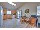 Fully equipped kitchen with oak cabinets and breakfast nook at 5916 Naperville St, Las Vegas, NV 89130
