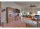 Bright living room with built-in wooden cabinet and hardwood floors at 5916 Naperville St, Las Vegas, NV 89130