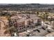 Aerial view of building, golf course, lake at 64 Strada Principale # 205, Henderson, NV 89011