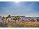 Aerial view of community, showcasing mountain backdrop at 64 Strada Principale # 205, Henderson, NV 89011