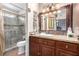 Primary bathroom with granite countertop and walk-in shower at 6442 Cedar Breaks Ave, Las Vegas, NV 89156