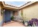 Cozy front patio with seating and potted plants at 6442 Cedar Breaks Ave, Las Vegas, NV 89156