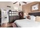 Main bedroom with wooden furniture and access to hallway at 6442 Cedar Breaks Ave, Las Vegas, NV 89156
