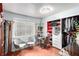 Bright home office with two chairs and a built-in closet at 6442 Cedar Breaks Ave, Las Vegas, NV 89156
