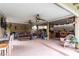 Covered patio with outdoor kitchen, dining area, and seating at 6442 Cedar Breaks Ave, Las Vegas, NV 89156