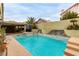 Inviting backyard pool with a waterfall feature at 6442 Cedar Breaks Ave, Las Vegas, NV 89156