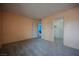 Bedroom featuring a closet and doorway, complemented by plush carpeting at 6443 Silverfield Dr, Las Vegas, NV 89103