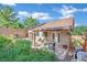 Private backyard featuring a covered patio, a dining area, and mature trees at 725 Pacific Cascades Dr, Henderson, NV 89012
