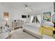 Main bedroom with king-size bed and sliding glass doors to patio at 725 Pacific Cascades Dr, Henderson, NV 89012