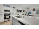 Stylish kitchen features a center island and modern stainless steel appliances at 725 Pacific Cascades Dr, Henderson, NV 89012