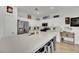 Spacious kitchen with stainless steel appliances, ample storage, and a large center island at 725 Pacific Cascades Dr, Henderson, NV 89012