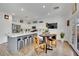 Open concept kitchen, island with bar seating and stainless appliances at 725 Pacific Cascades Dr, Henderson, NV 89012