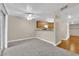 Dining area with carpet and access to kitchen and patio at 7950 W Flamingo Rd # 1041, Las Vegas, NV 89147