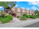 Exterior view of a light brown building with landscaping and walkway at 7950 W Flamingo Rd # 1041, Las Vegas, NV 89147