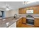 Modern kitchen with stainless steel appliances and granite countertops at 7950 W Flamingo Rd # 1041, Las Vegas, NV 89147
