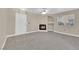 Living room with fireplace and carpet near entryway at 7950 W Flamingo Rd # 1041, Las Vegas, NV 89147