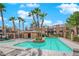Community pool with spa and lounge chairs at 7950 W Flamingo Rd # 1041, Las Vegas, NV 89147