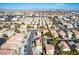 Beautiful aerial view of a home with solar panels in a well-maintained neighborhood close to the Las Vegas Strip at 8736 Summoners Ct, Las Vegas, NV 89139