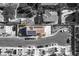 Overhead view of home featuring a tile roof, solar panels, and a spacious driveway at 8736 Summoners Ct, Las Vegas, NV 89139