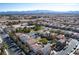 Aerial view of house with pool and surrounding neighborhood at 8736 Summoners Ct, Las Vegas, NV 89139