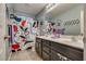 Bathroom with double sink vanity and decorative shower curtain at 8736 Summoners Ct, Las Vegas, NV 89139