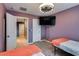 Bedroom with twin beds, and connected bathroom door at 8736 Summoners Ct, Las Vegas, NV 89139