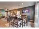 Open dining room featuring hardwood floors and access to the cozy living room at 8736 Summoners Ct, Las Vegas, NV 89139